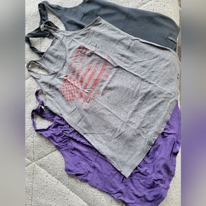 4 Womens UA tank tops